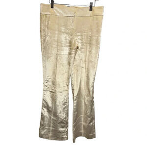 Woman’s bebe brand velour pants. Boot cut mid rise in cream Size 8.